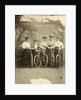 Group portrait of five women with bikes for a painted backdrop with forest by Anonymous