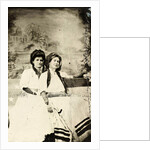 Portrait of two women sitting on a bench in front of a painted backdrop (chapel or church (?) In a lake), in the left part of the American flag by Anonymous