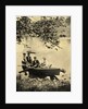 Two men and two women in a rowboat on a lake by Anonymous