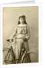 Portrait of young woman in dress with ladies bike by Alex van Dijck