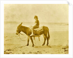 Girl on donkey on the beach North Sea, the Netherlands or Germany by Anonymous