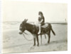 Girl on donkey on the beach (North Sea), the Netherlands or Germany by Anonymous