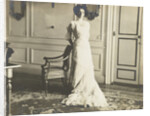 Unidentified woman standing in an interior by Anonymous