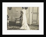 Unidentified woman standing in an interior by Anonymous