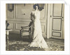 Unidentified woman standing in an interior by Anonymous