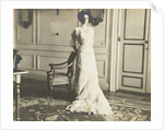 Unidentified woman standing in an interior by Anonymous