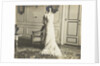 Unidentified woman standing in an interior by Anonymous