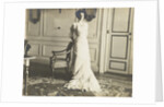 Unidentified woman standing in an interior by Anonymous