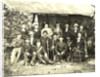 Group portrait of hikers in a makeshift studio by Anonymous