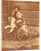 Louis Asser, son of the photographer, on a tricycle by Eduard Isaac Asser
