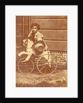 Louis Asser, son of the photographer, on a tricycle by Eduard Isaac Asser