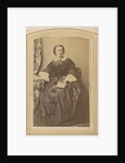 Portrait of a seated woman in a dress with a book in hand by London and Continental Photographic Copying Company