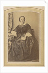 Portrait of a seated woman in a dress with a book in hand by London and Continental Photographic Copying Company