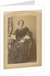 Portrait of a seated woman in a dress with a book in hand by London and Continental Photographic Copying Company