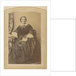 Portrait of a seated woman in a dress with a book in hand by London and Continental Photographic Copying Company
