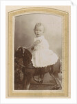 Portrait of a toddler in a dress on a rocking horse by C.J.L. Vermeulen