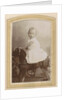 Portrait of a toddler in a dress on a rocking horse by C.J.L. Vermeulen