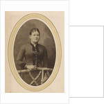 Portrait of a woman with upswept hair, a jacket with buttons and an ornament by J.H. van der Laag