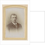 Portrait of a man wearing a coat and tie by J.C. Reesinck