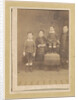 Portrait of four children in a chair by Anonymous