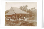 Man and woman posing for a house with a garden in Ambon, Indonesia by Anonymous