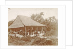 Man and woman posing for a house with a garden in Ambon, Indonesia by Anonymous