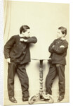 Two guys standing at table, acting attack posture and inaccessibility by L. de Koningh