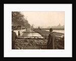 People look at the high elevations of the Seine during the flooding of Paris by France