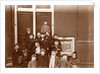 Group of children posing on stairs for entrance doors by Anonymous