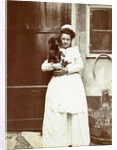 Maid with a dachshund in her arms at an outside tap by Anonymous