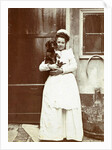 Maid with a dachshund in her arms at an outside tap by Anonymous