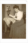 Book Reading woman sitting at a table with a vase of flowers by Anonymous