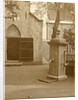 Pump on a church square by Anonymous