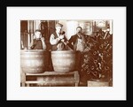 Brouwer and attendants cleaning bottles at a bottle drying rack by Anonymous