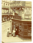 Two women and three children standing at the entrance of wine trade Caves St. Germain by Anonymous