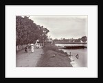 Hikers on a riverbank in Surabaya and in the background the Goebengbrug, Indonesia by Anonymous