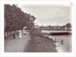 Hikers on a riverbank in Surabaya and in the background the Goebengbrug, Indonesia by Anonymous