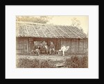 Dutch soldiers sitting in front of a wooden house in the Dutch East Indies by Anonymous