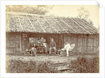 Dutch soldiers sitting in front of a wooden house in the Dutch East Indies by Anonymous
