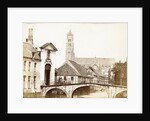 View of a gate, a bridge and a church in Bruges, Belgium by Victor Daveluy