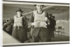 Two men wearing life jackets on board a ship by Anonymous