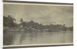 Bank of a village with derricks and buildings seen from the water by Anonymous