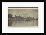 Bank of a village with derricks and buildings seen from the water by Anonymous