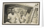 Two Indian boys sitting in roofed wooden boat by Anonymous