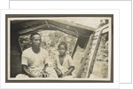 Two Indian boys sitting in roofed wooden boat by Anonymous