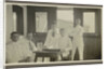 Five men in tropical attire sitting around a table by Anonymous