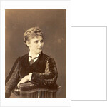 Studio Portrait of a woman sitting on a chair with curved back by Anonymous