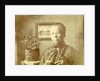 Portrait of an old lady with glasses in a living room by Anonymous