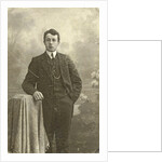 Studio Portrait of a young man standing by Jacobus Vetter