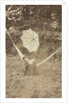 Portrait of a woman in a hammock with a parasol by Anonymous